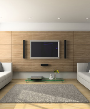 Wohnzimmer mit TV und Holzimitatwand