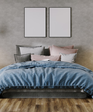 Modernes Schlafzimmer mit grauer Betonwand